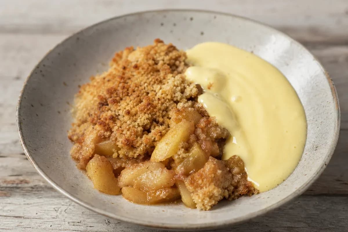 British Apple Crumble with Creamy Vanilla Custard Sauce