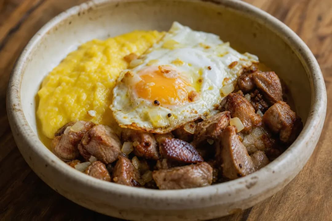 Romanian Tochitură with Pork, Creamy Polenta and Fried Egg