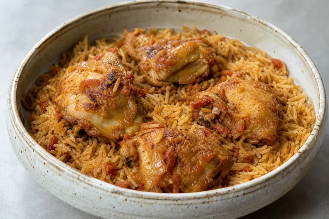 Plated Saudi Kabsa with tender chicken, vibrant spices, and fluffy basmati rice.